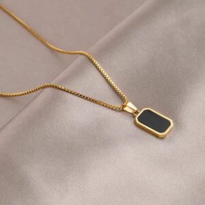 sleek gold black pendant necklace